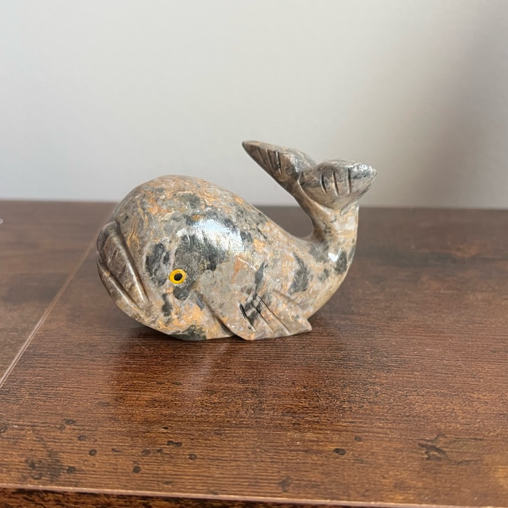 carved whale rock decoration